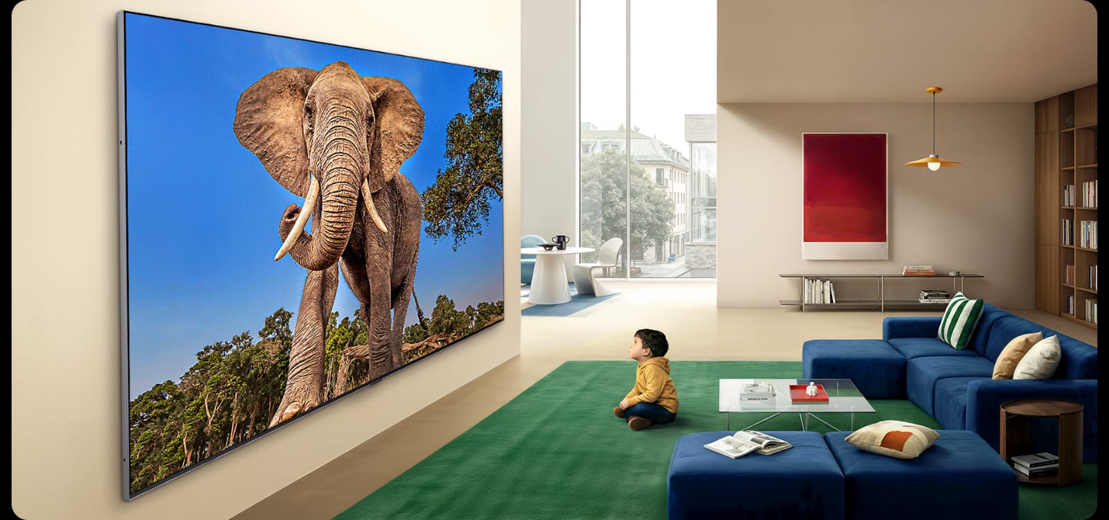 LG 115-inch QNED evo AI Mini LED TV wall-mounted in a living room